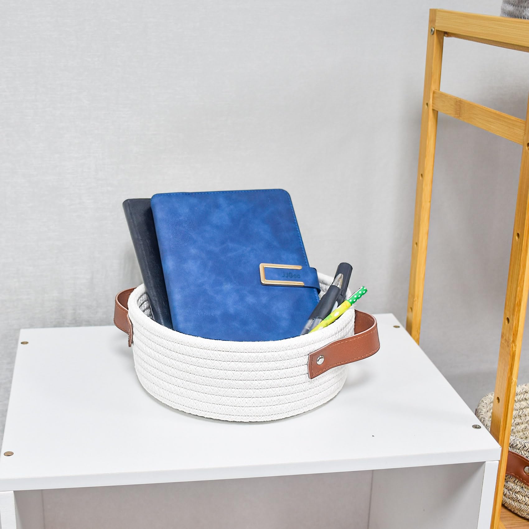 ABenkle mini basket on shelf demonstrating decorative boho charm and clutter reduction.