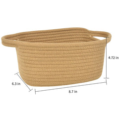 ABenkle mini cotton rope basket serves as a stylish bedside organizer.