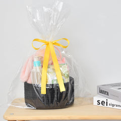ABenkle nursery side table decor basket adds soft texture to room.