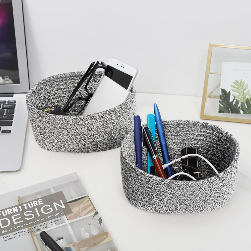 ABenkle oval rope basket office use for cables and stationery.