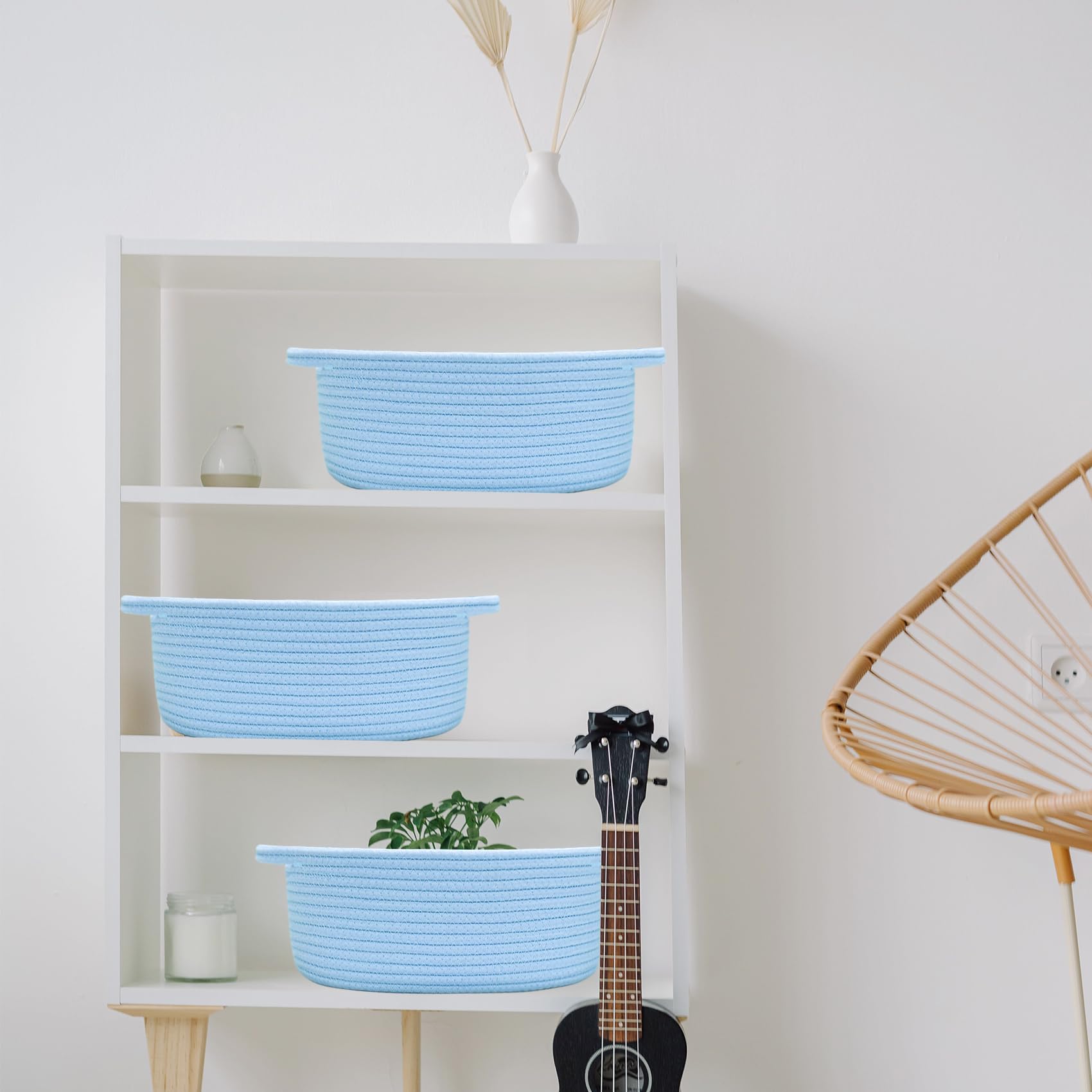 ABenkle small basket keeps baby items organized without scratching floors