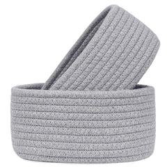 ABenkle small oval basket in cotton rope for compact storage and desk organization.
