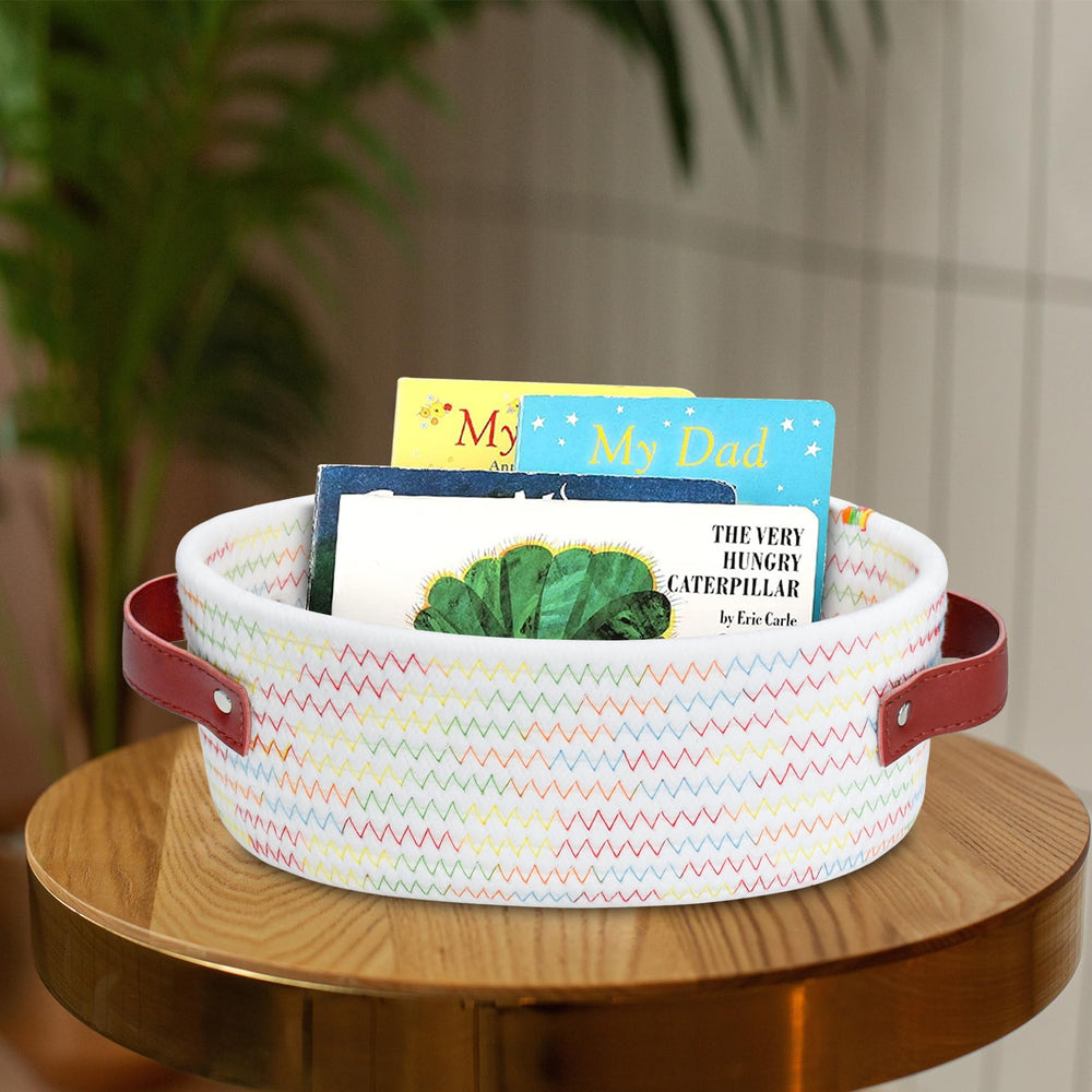 ABenkle small oval basket on kitchen counter for towels or receipts