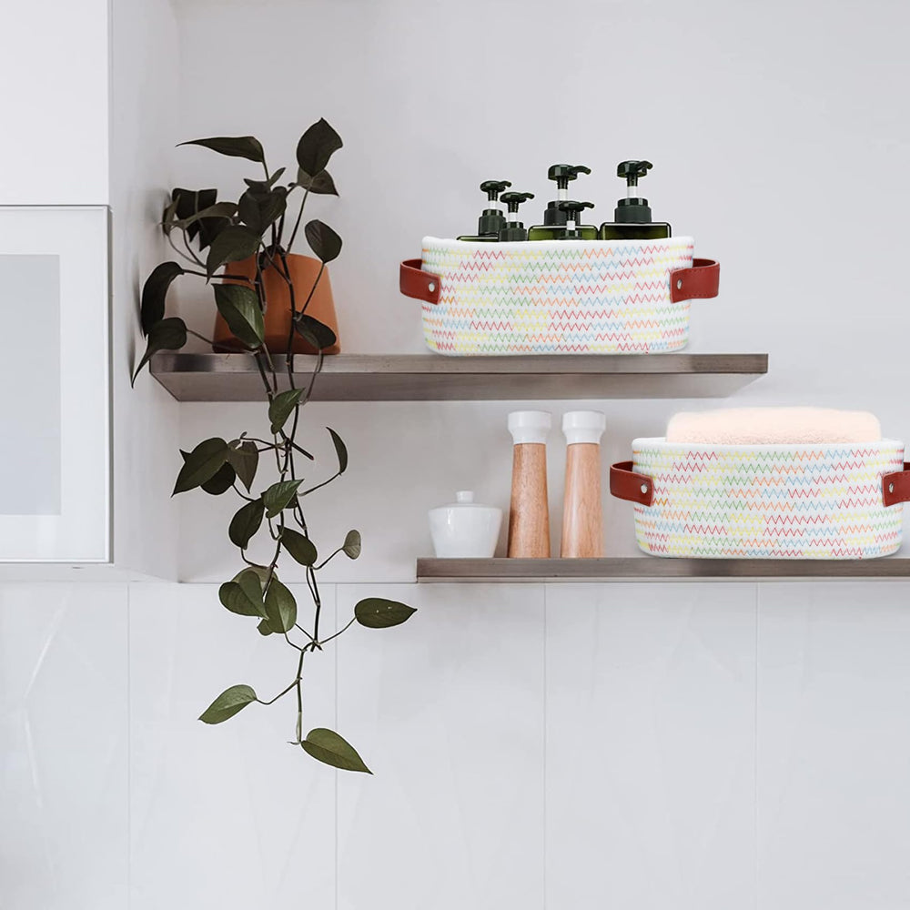ABenkle small oval basket on nursery shelf for toys and essentials