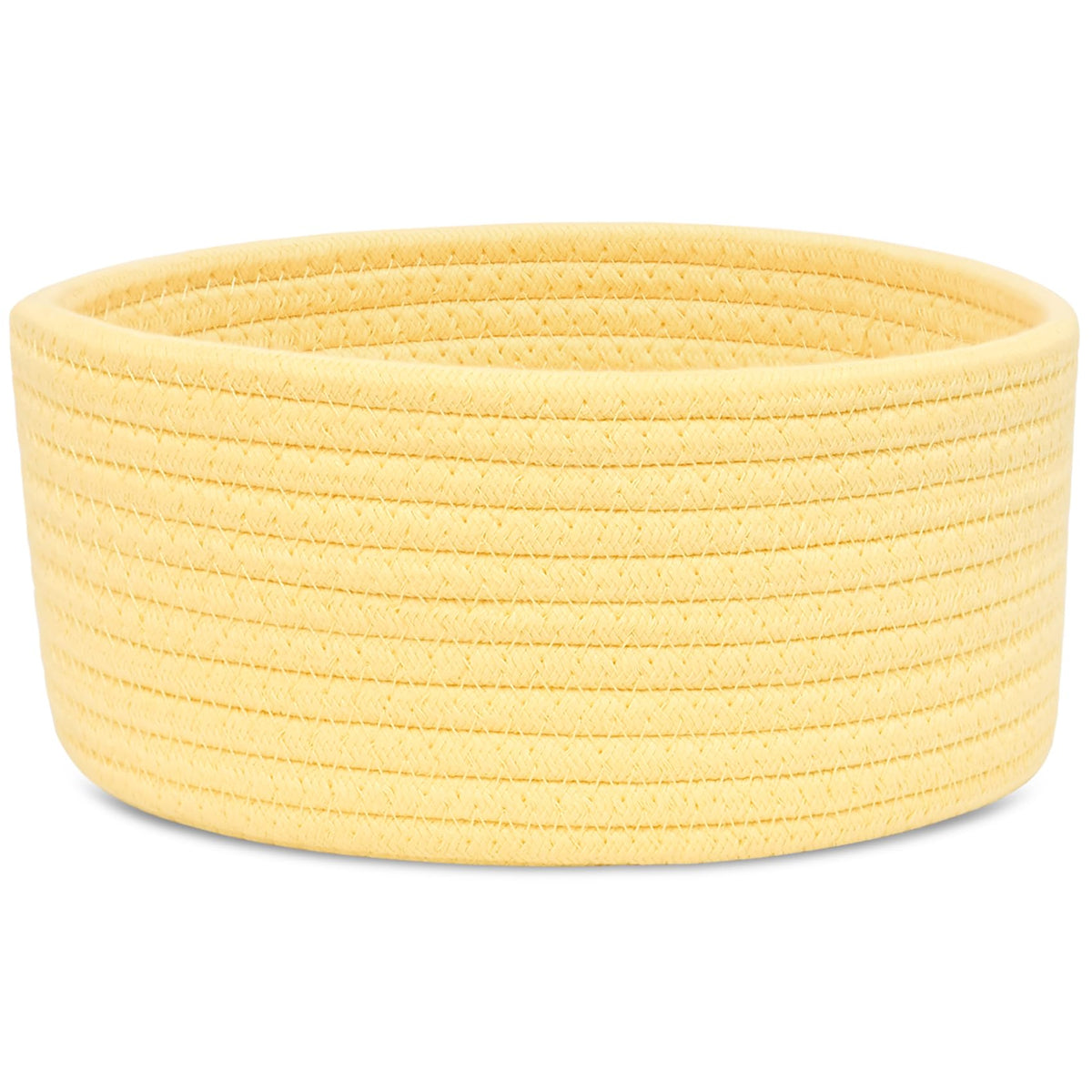 ABenkle small round basket on a desk for easy small-item organization.