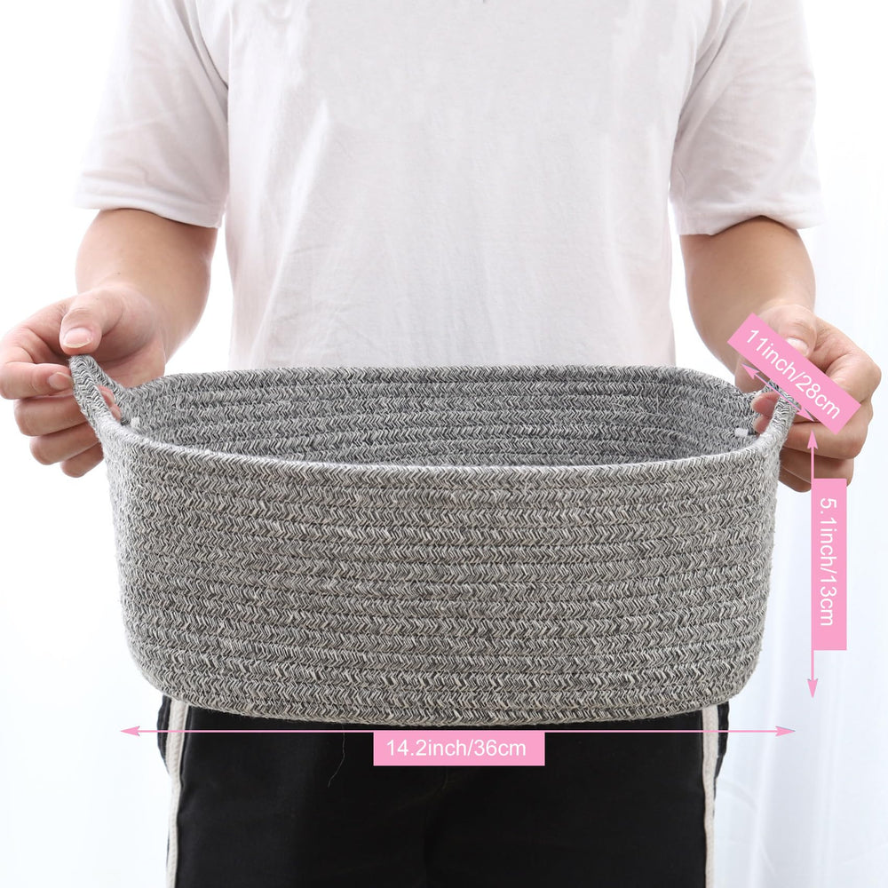 ABenkle basket handles detail highlighting portable toy bin and easy carrying.