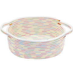 ABenkle small woven basket on shelf keeps toys organized.