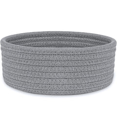 ABenkle small woven basket on desktop setup for tidy desk organization and easy access.