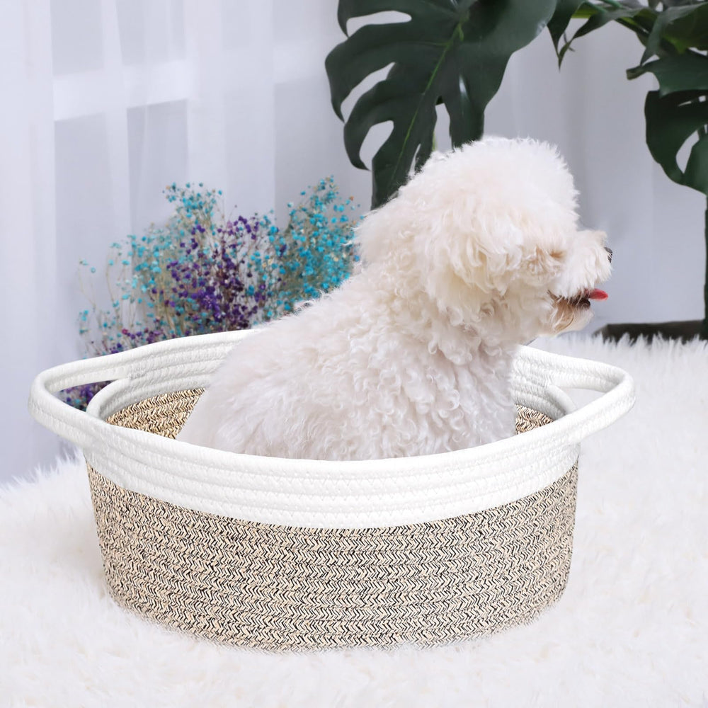 ABenkle small woven basket with baby items and towels in nursery
