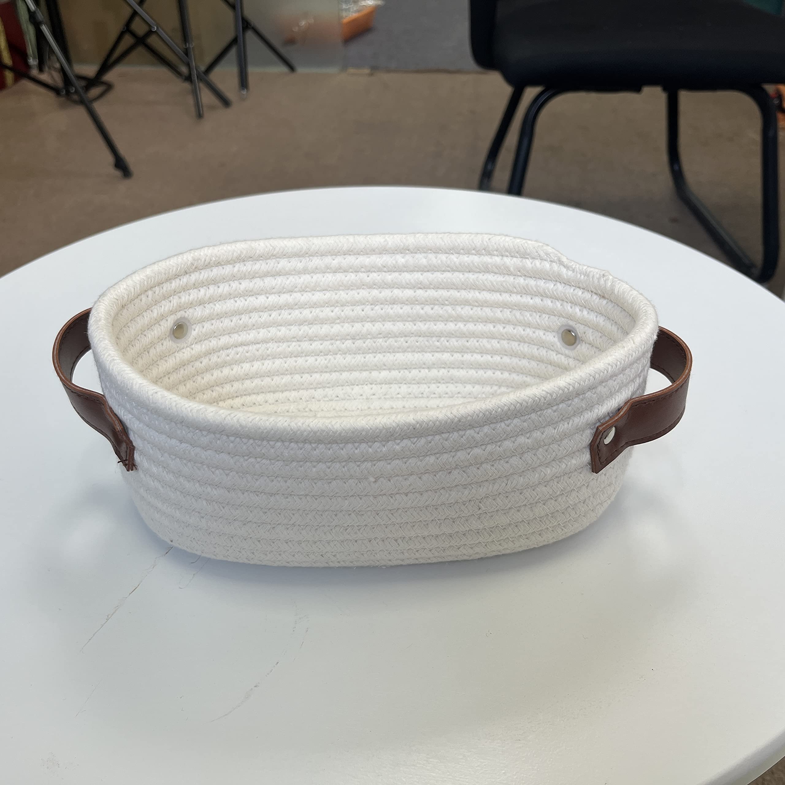 ABenkle small woven basket kid-friendly material safe for toys and snacks.