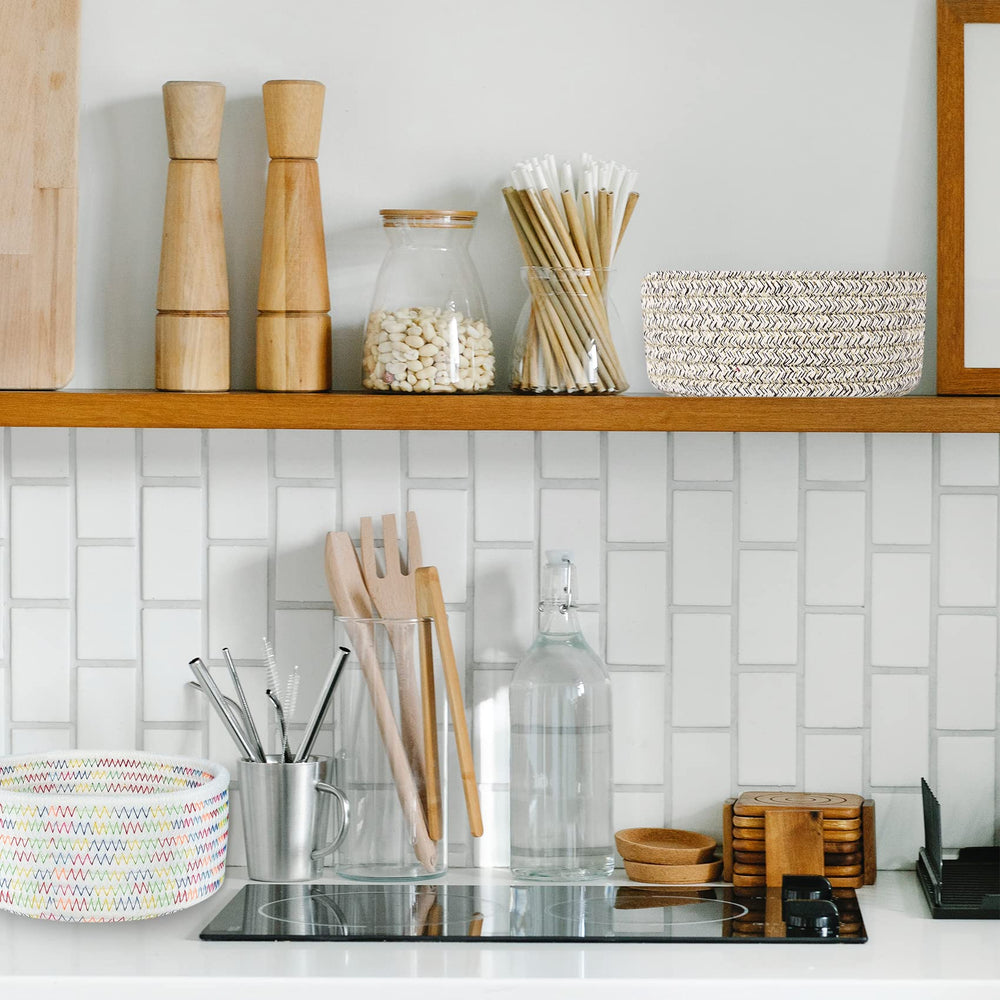 ABenkle small woven basket on kitchen counter for napkins and notes.