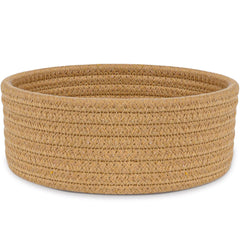 ABenkle small woven basket on nightstand offers tidy, accessible storage for daily essentials.
