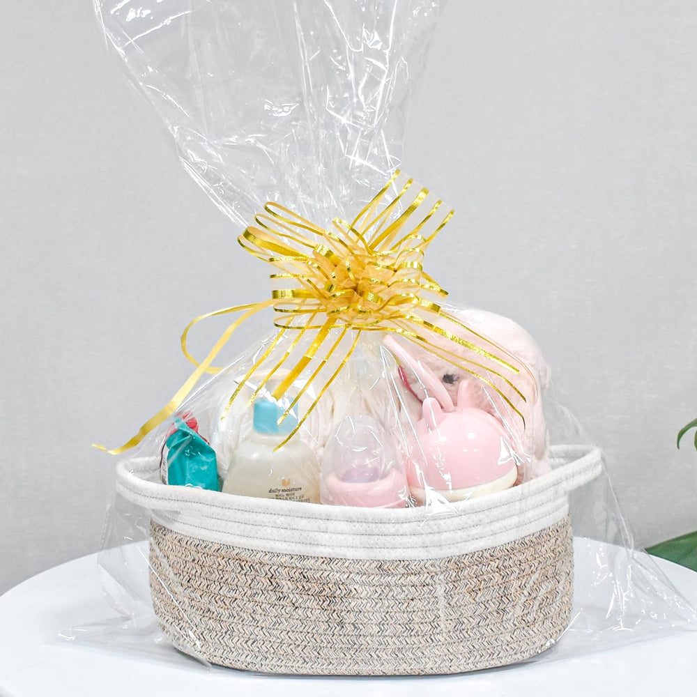 ABenkle small woven basket arranged for nursery decor and easy access