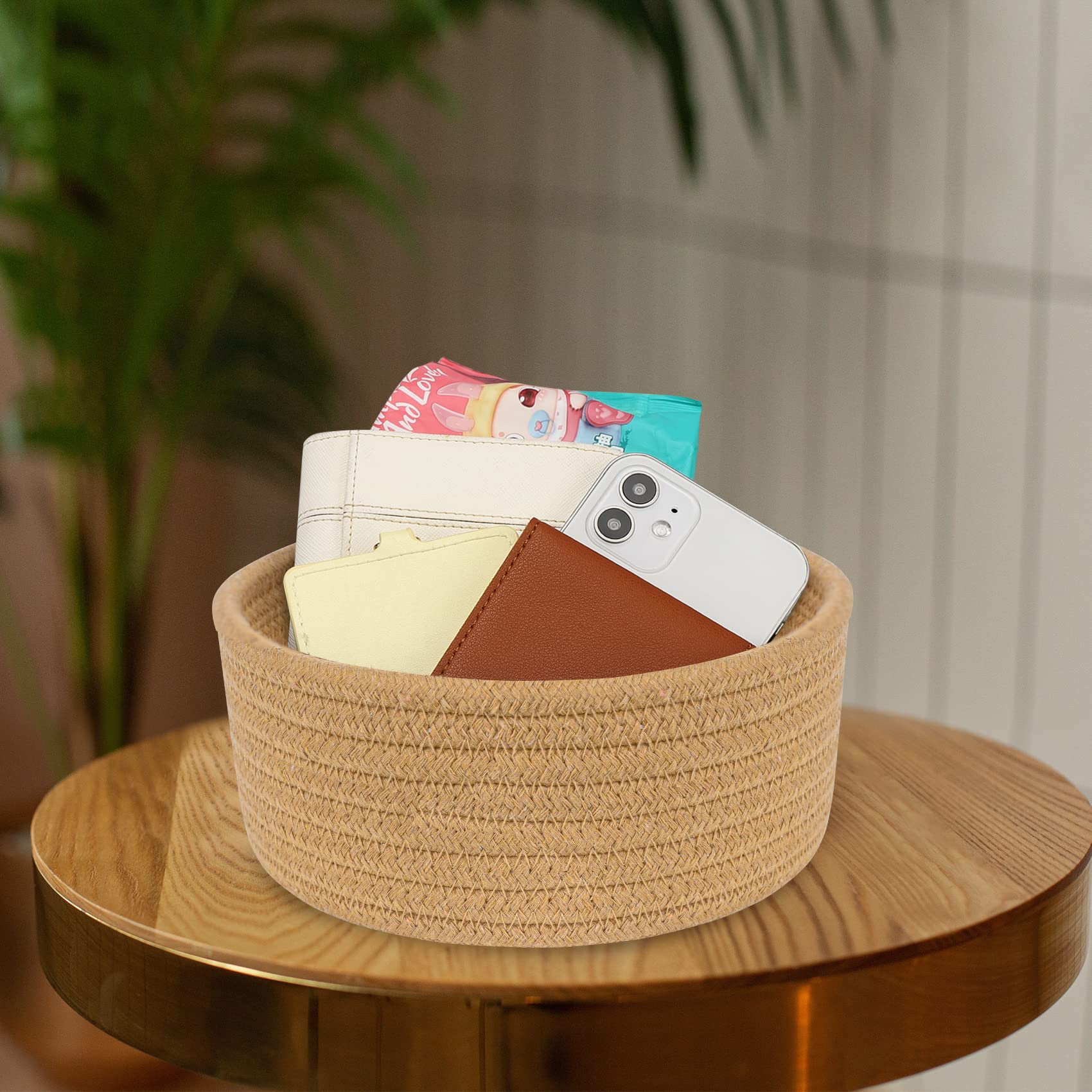 ABenkle nursery storage basket keeps small toys and baby supplies neatly within reach.