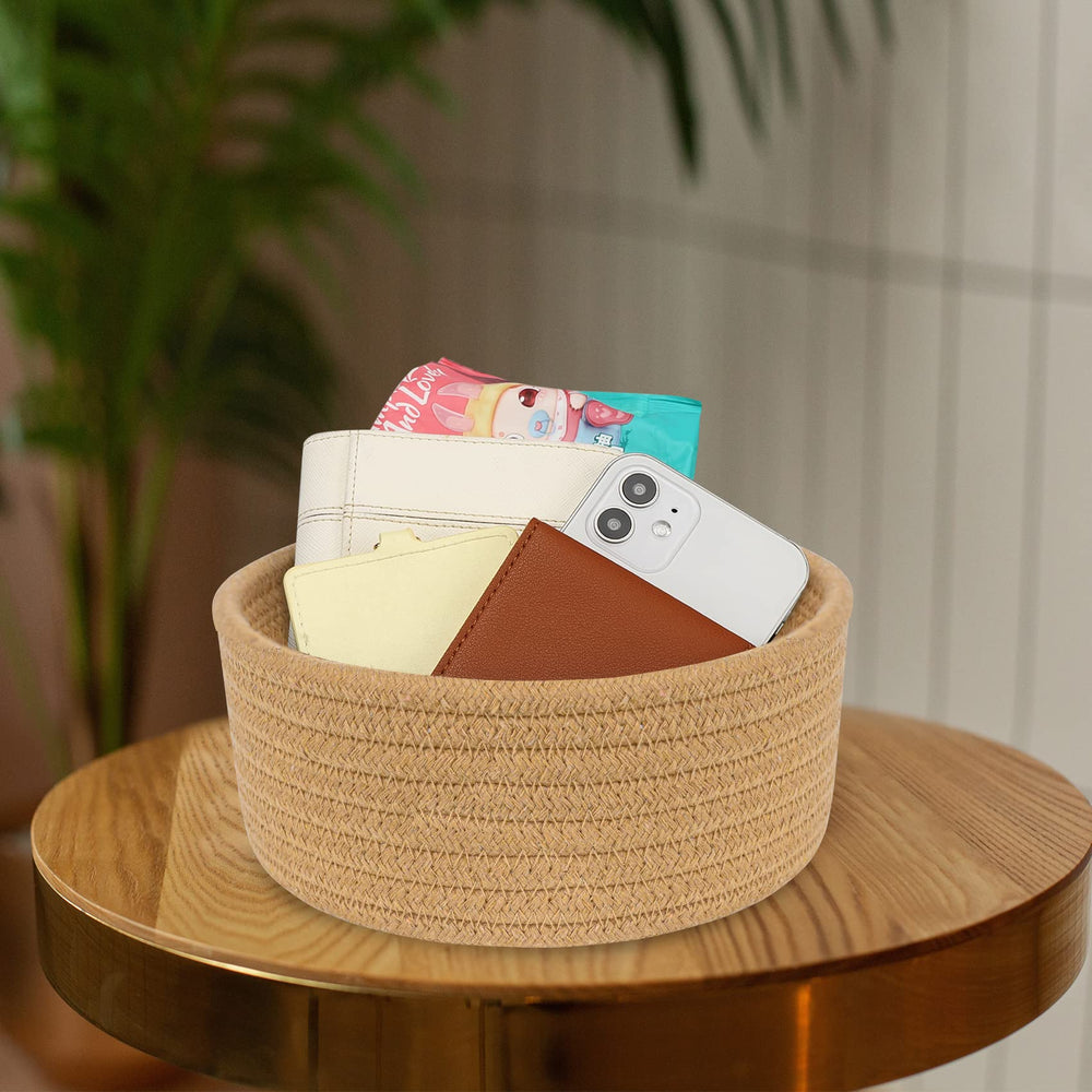 ABenkle nursery storage basket keeps small toys and baby supplies neatly within reach.