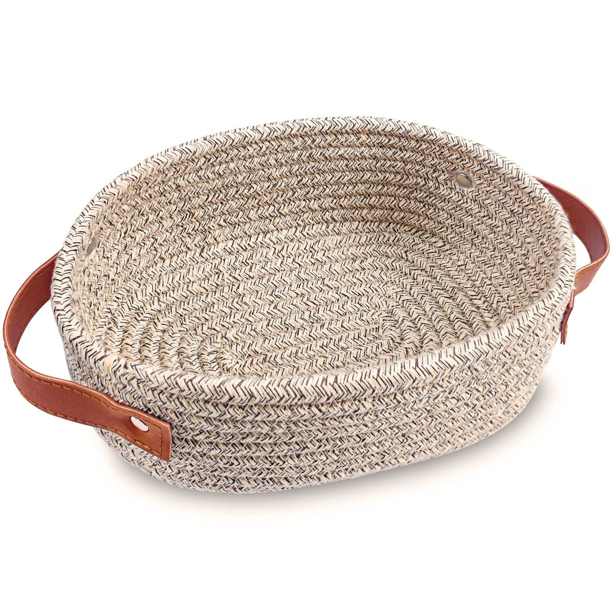 ABenkle small woven basket in oval shape for tidy bedside essentials.