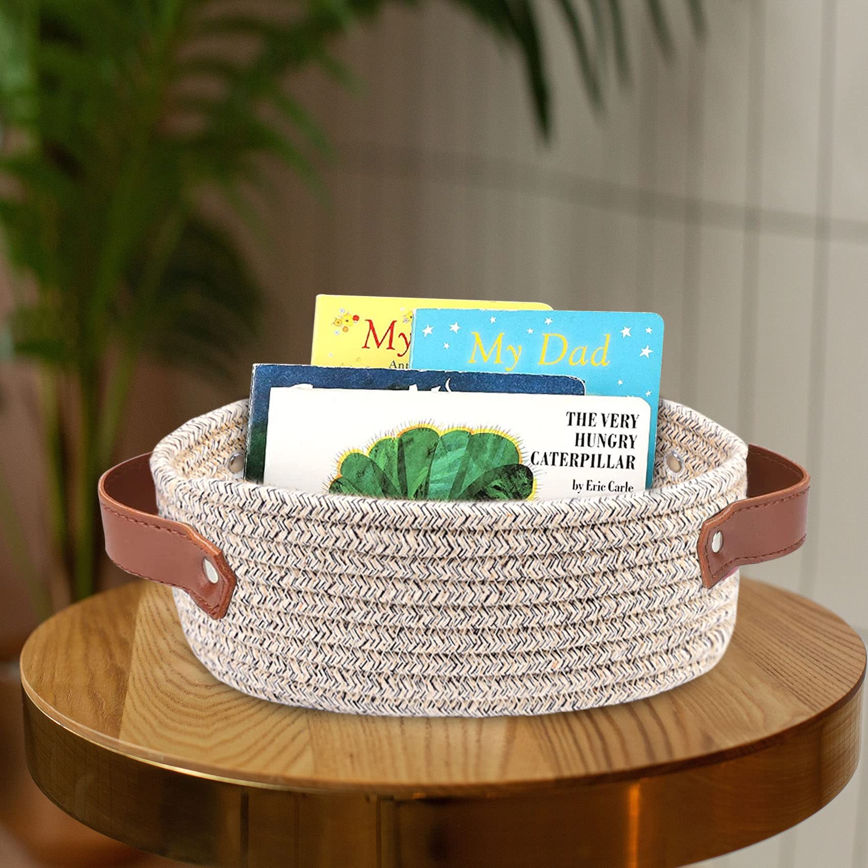 ABenkle small woven basket on shelf for decorative organization.