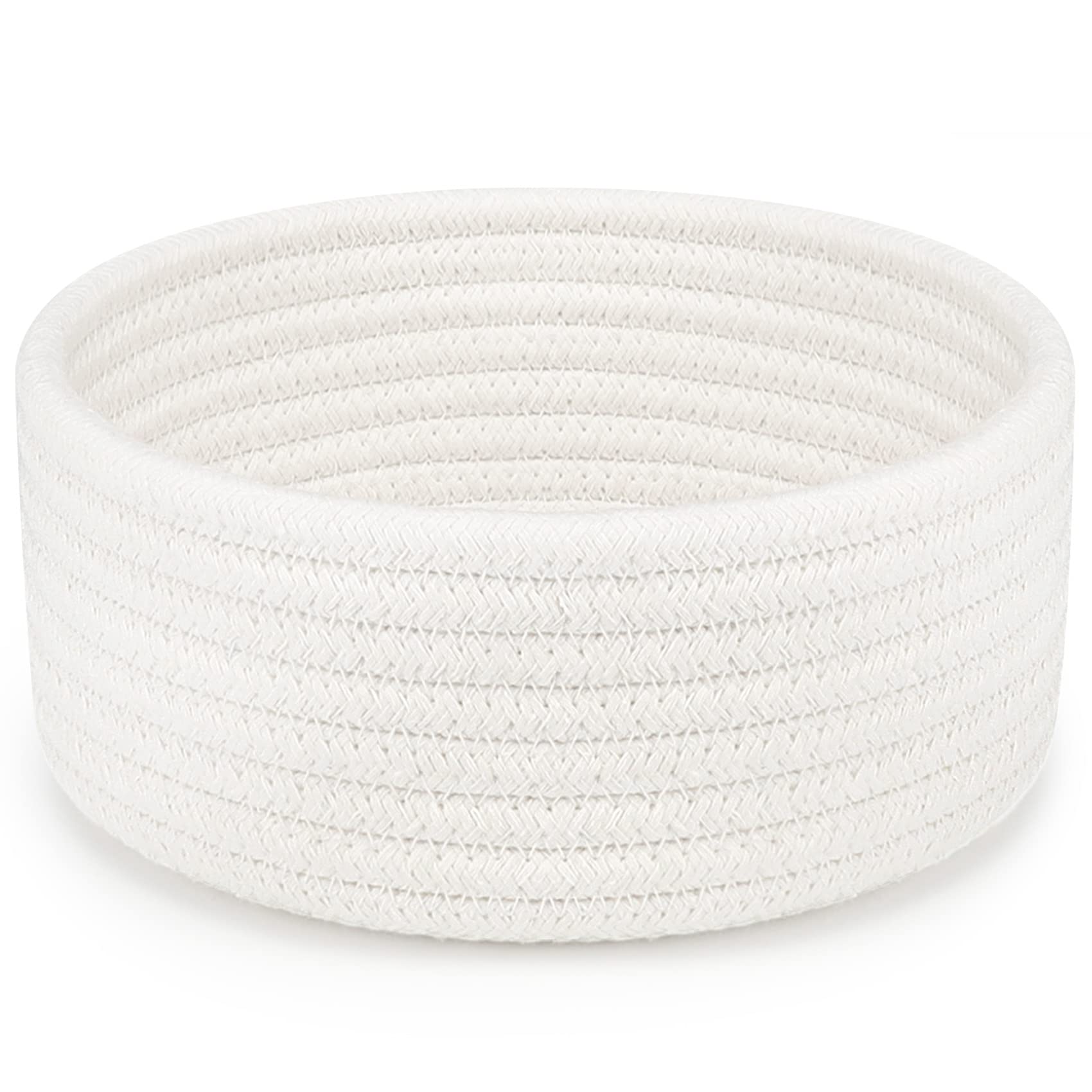 ABenkle small woven basket white side view, ideal for organizing remotes and small essentials.
