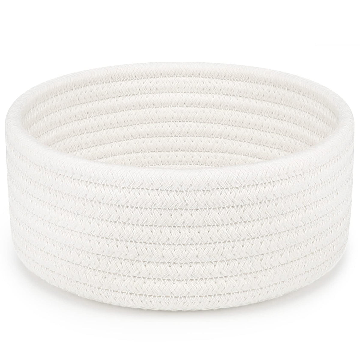 ABenkle small woven basket white side view, ideal for organizing remotes and small essentials.