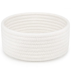 ABenkle small woven basket white side view, ideal for organizing remotes and small essentials.