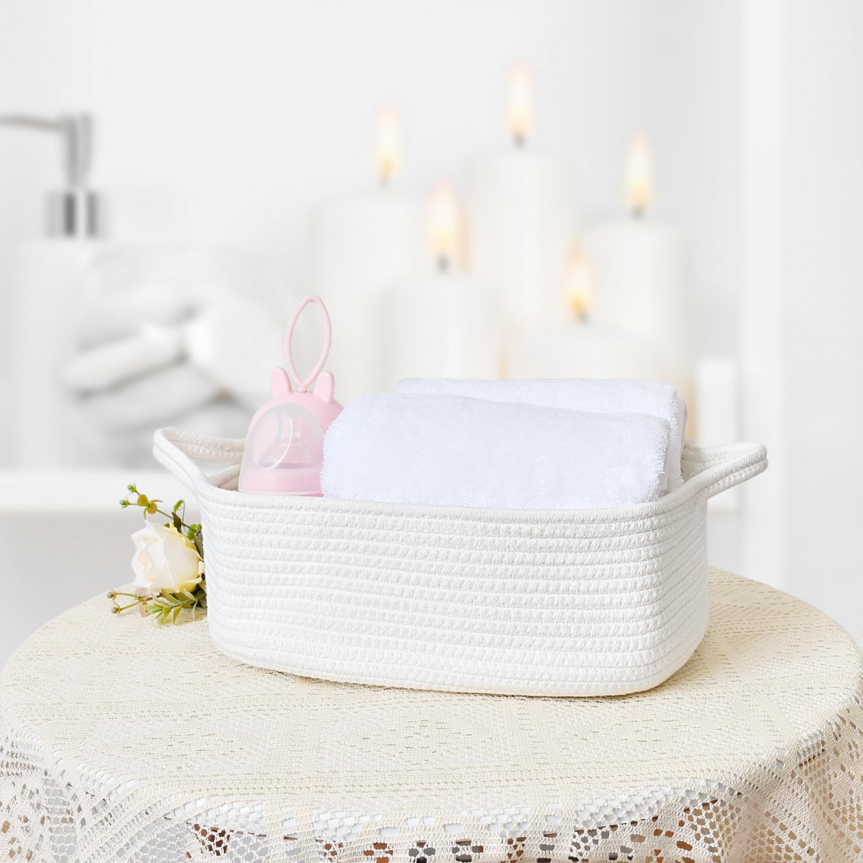 ABenkle woven basket holding towels and blankets for accessible storage