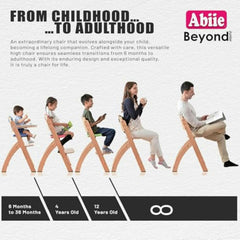 Abiie Beyond Junior wood high chair with secure 5-point harness for safe mealtimes.