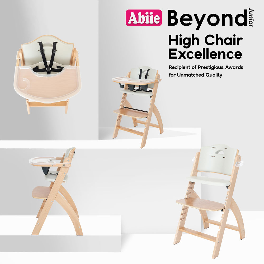 Abiie Beyond Junior wood high chair waterproof cushion resists spills.