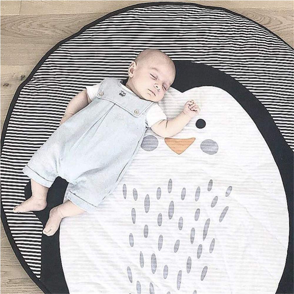 ABREEZE penguin play mat used as stroller blanket on outings.