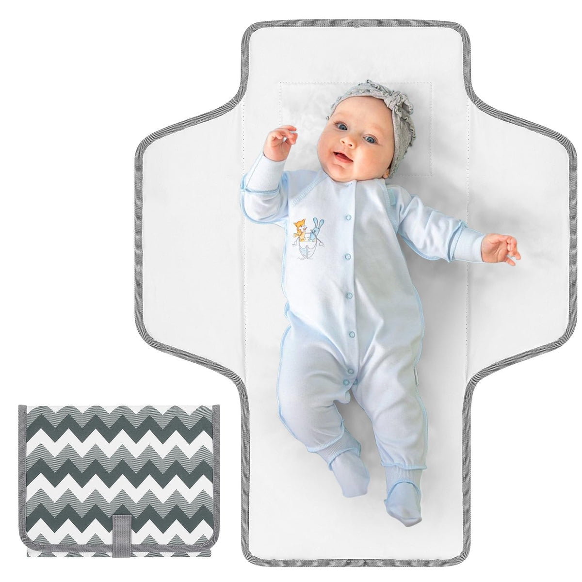 Accmor portable diaper changing pad folded and tucked in a baby bag for travel convenience.