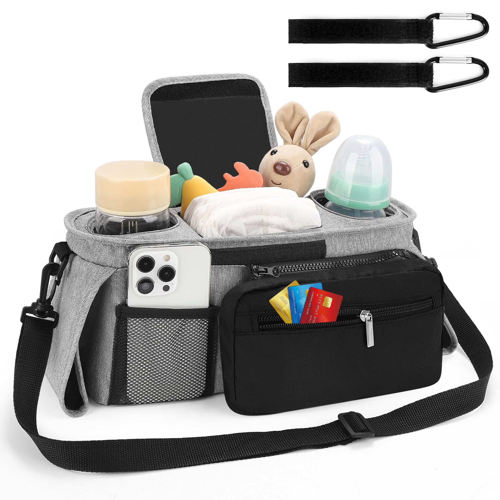 Accmor organizer middle compartment fits diapers, wipes, and pacifiers on the go.