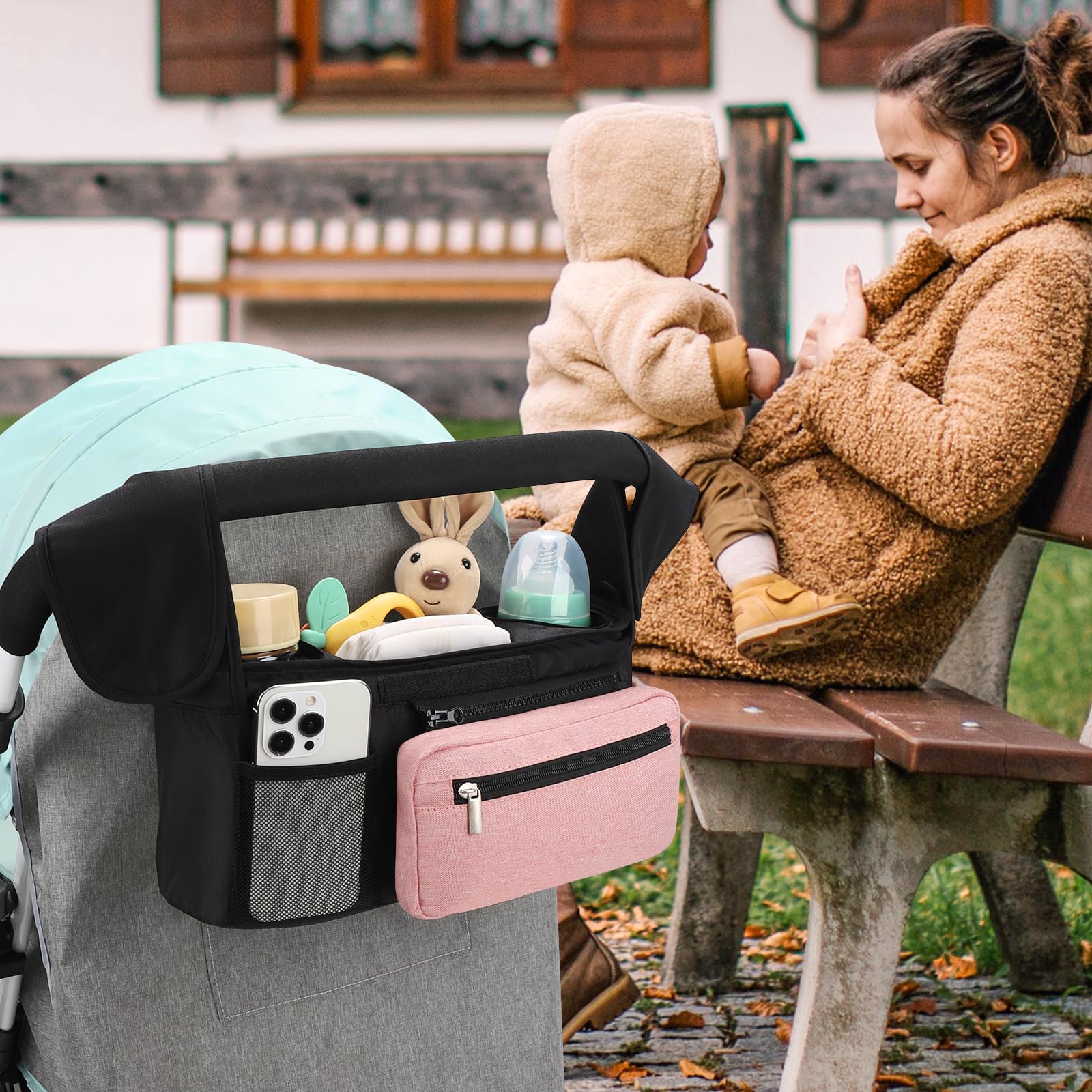 Accmor middle storage compartment fits diapers, wipes, pacifiers, and toys.