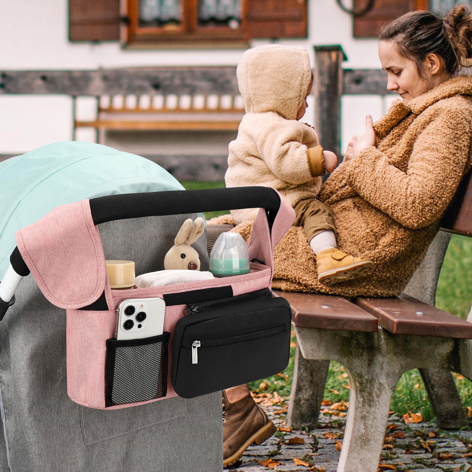 Accmor organizer middle compartment holds diapers, wipes, and accessories for quick access.