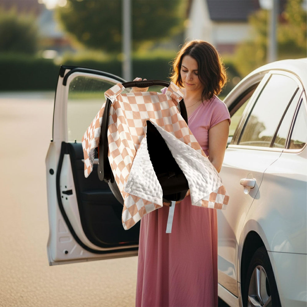 AceOrbit nursing cover use illustrates versatile canopy for feeding and privacy.