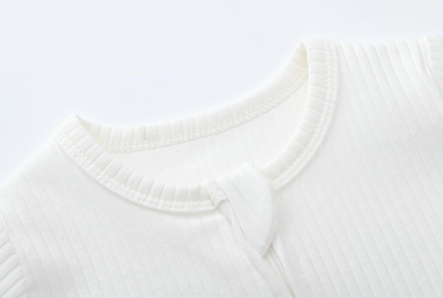 ACESTAR baby footed pajamas show foot coverage and cozy fit.