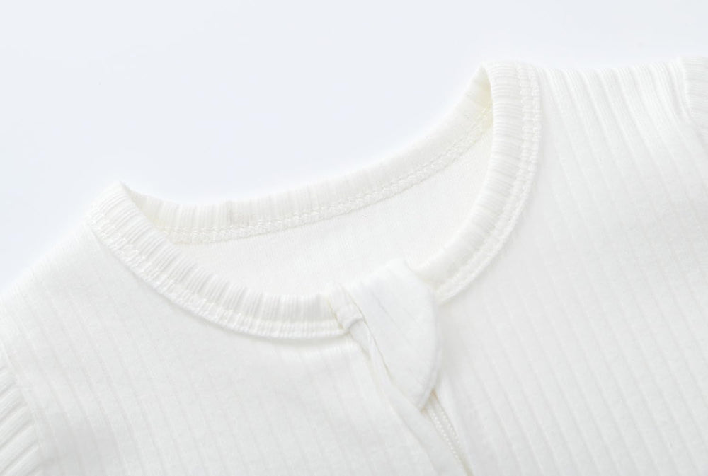 ACESTAR baby footed pajamas show foot coverage and cozy fit.