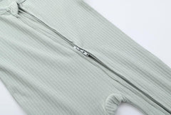 ACESTAR footed design keeps baby's feet warm and cozy all day