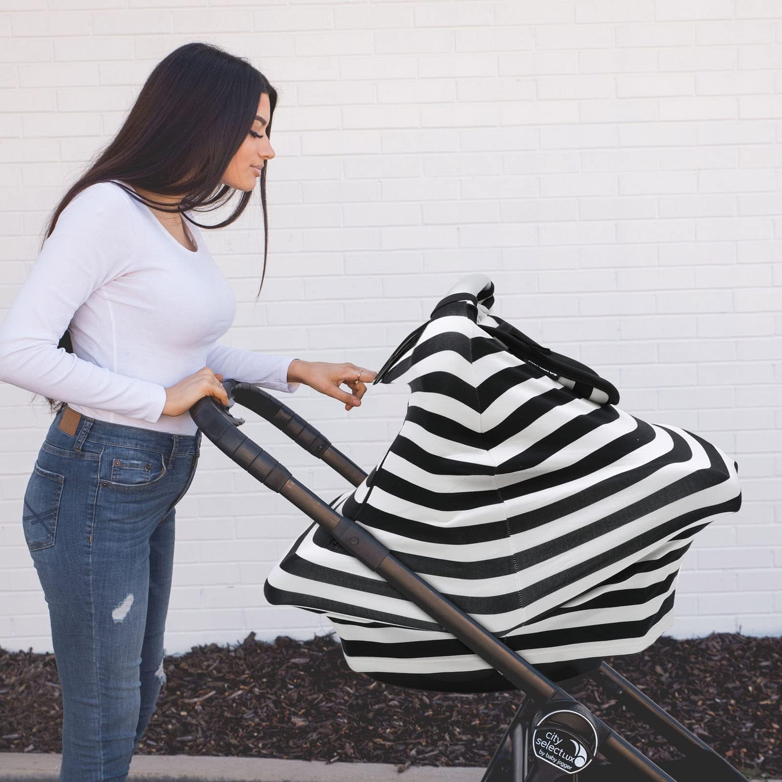ACRABROS car seat cover with four snaps to secure the fit on most seats.