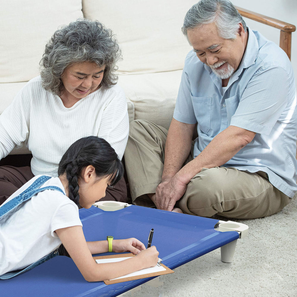 Acrimet Nap Cot in-use scene with caregiver for supervised rest