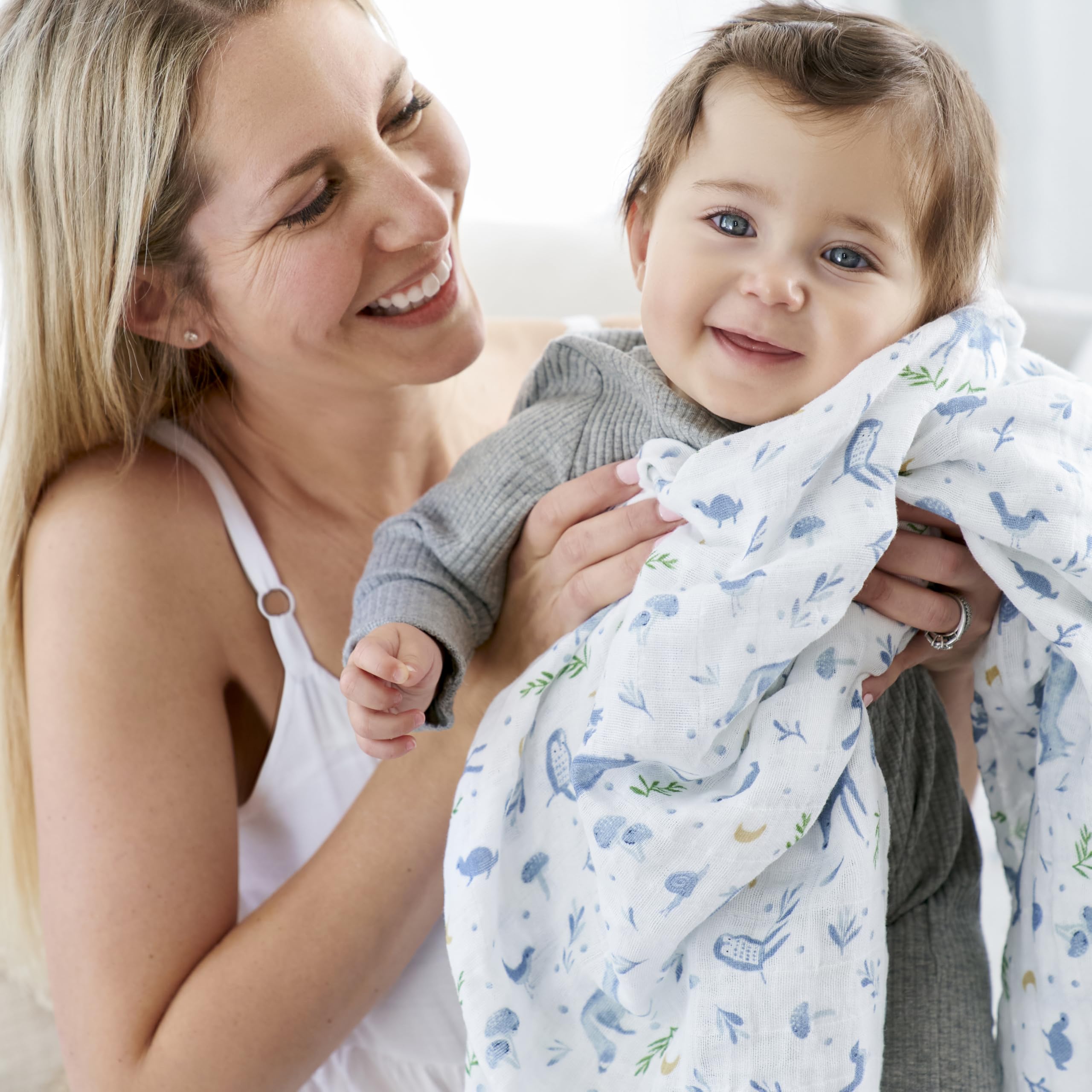 aden-anais baby blanket cuddle moment shows soft, durable fabric