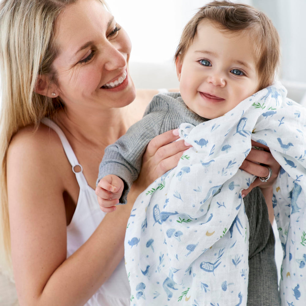 aden-anais baby blanket cuddle moment shows soft, durable fabric