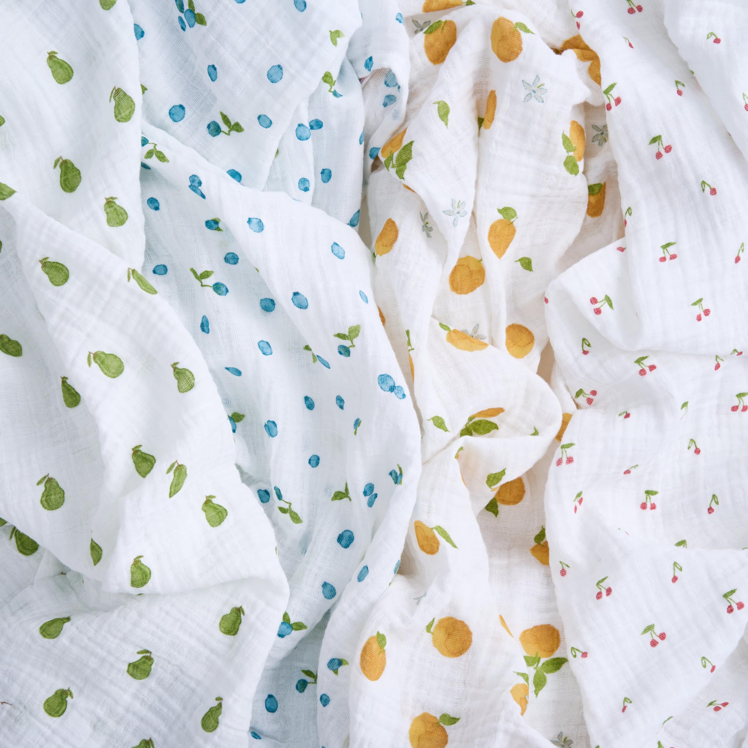 aden + anais Boutique Organic Swaddle Blanket used as nursing cover highlights multi-use convenience.