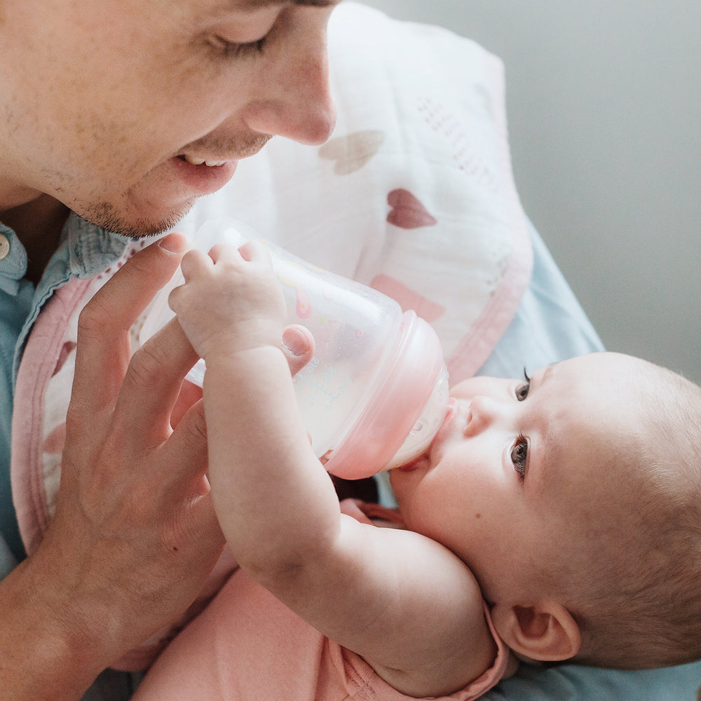 aden + anais Burpy Bib Heartbreaker print adds cute, practical baby-mess tool.