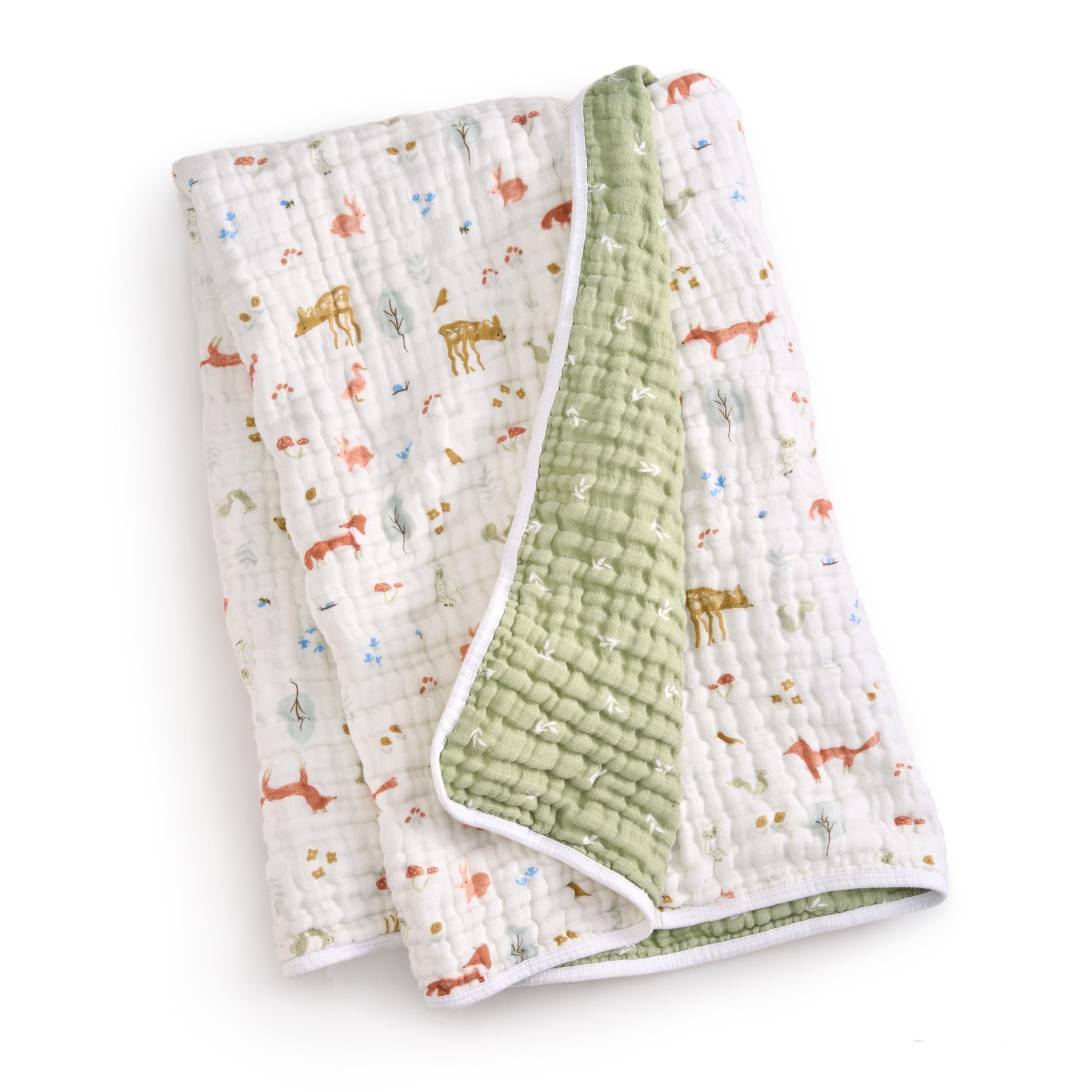 aden-anais Dream Blanket draped in crib scene for gentle bedtime snuggles