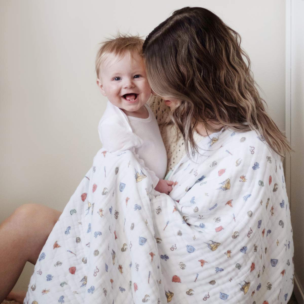aden + anais Dream Blanket care shot demonstrates easy machine-washable care.