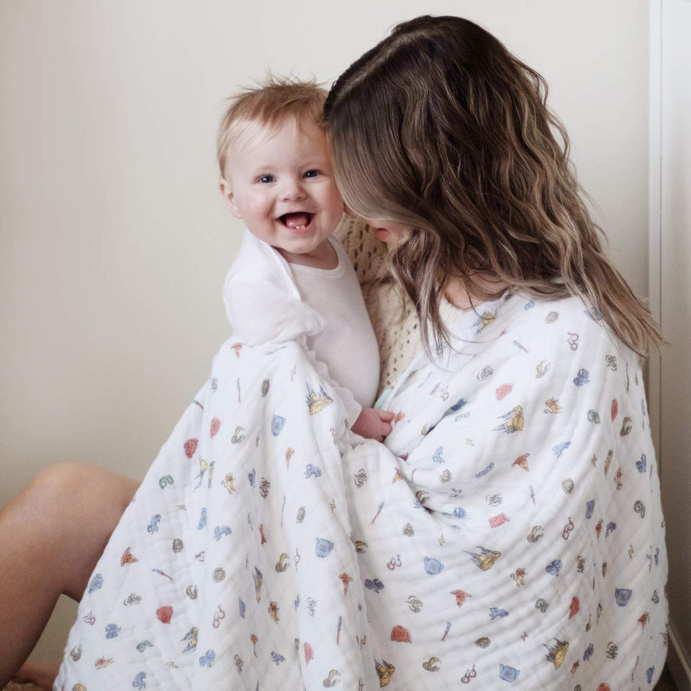 aden + anais Dream Blanket care shot demonstrates easy machine-washable care.
