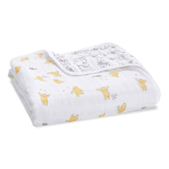 aden + anais Dream Blanket Winnie Pooh hero shot highlights breathable four-layer muslin comfort.