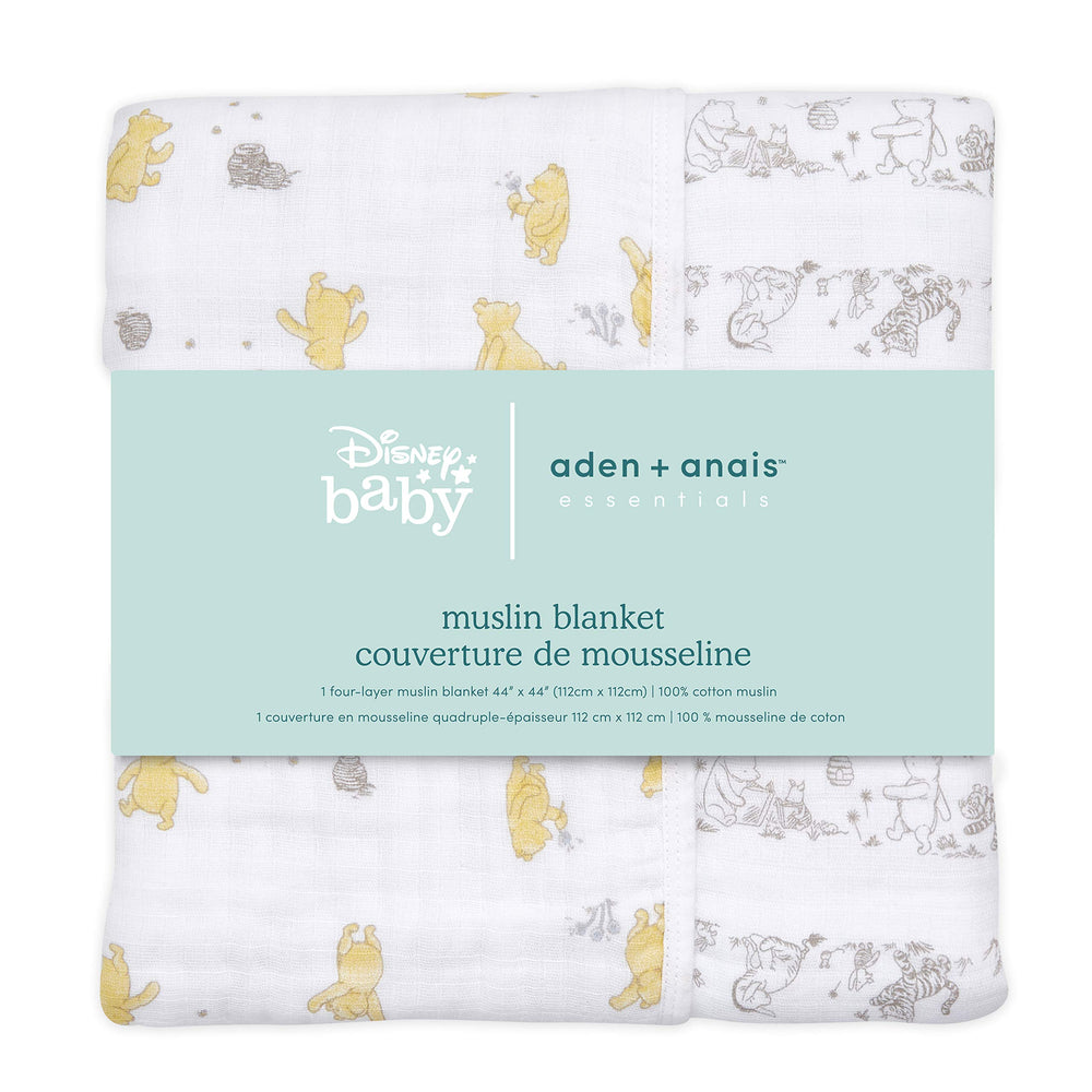 aden + anais Dream Blanket Winnie Pooh playtime use demonstrates generous size for cuddles.