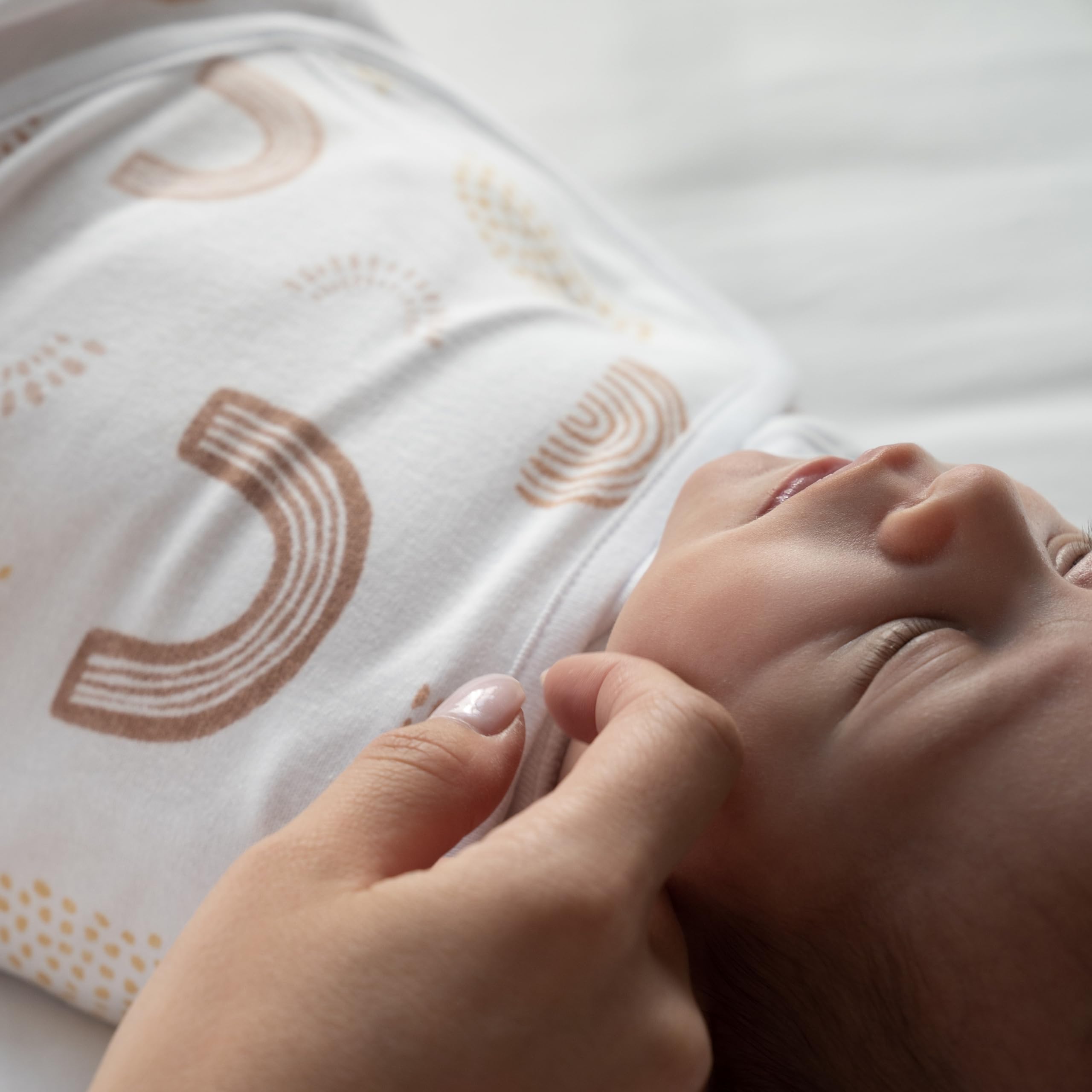 aden + anais tog 1.0 tag closeup confirms breathable warmth.