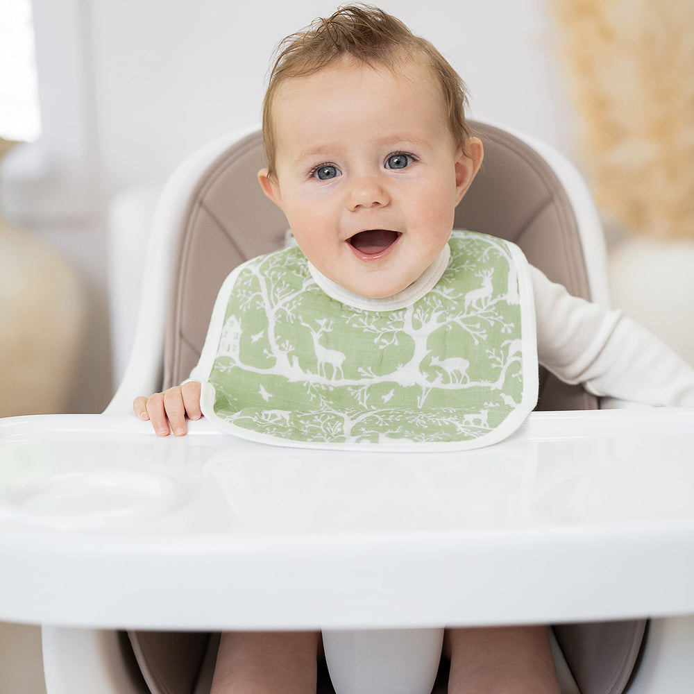 aden + anais Essentials bib laid flat to highlight durable, machine-washable three-layer muslin