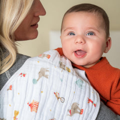 aden + anais Burpy Bib contoured with snap for secure, full coverage